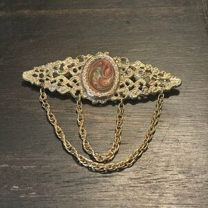 Vintage gold-tone art deco brooch